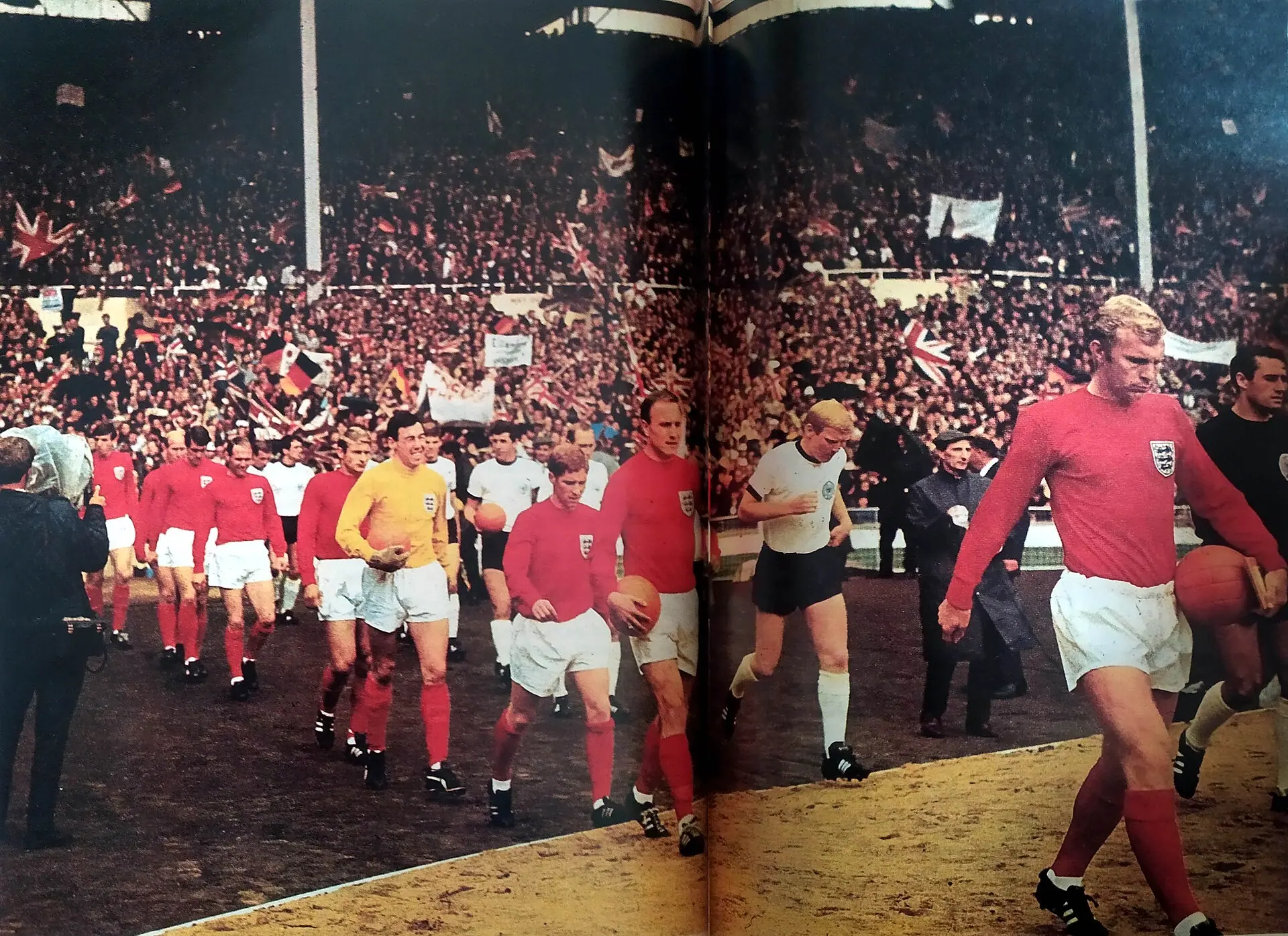 England, led by Bobby Moore, and West Germany walking out at Wembley for the 1966 World Cup final