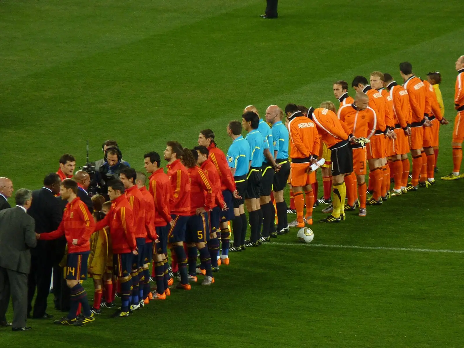 Both starting teams on the pitch before kick-off at Soccer City, 11 July 2010
