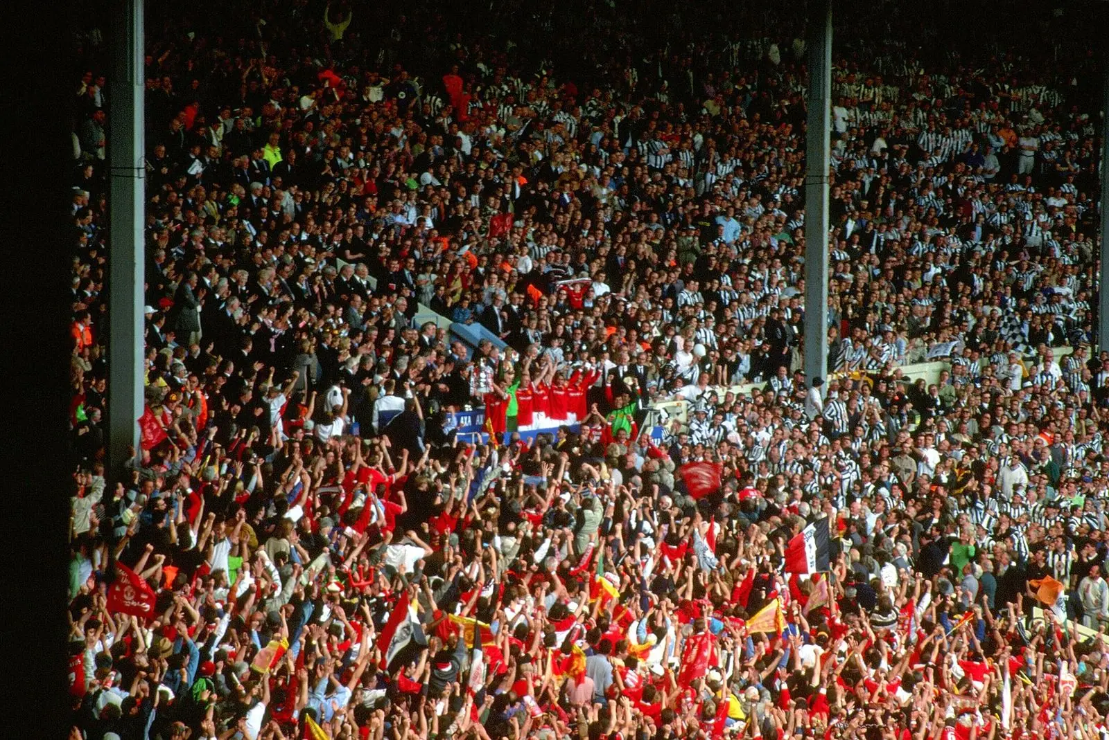 Roy Keane lifts the FA Cup after the 1999 final at Wembley