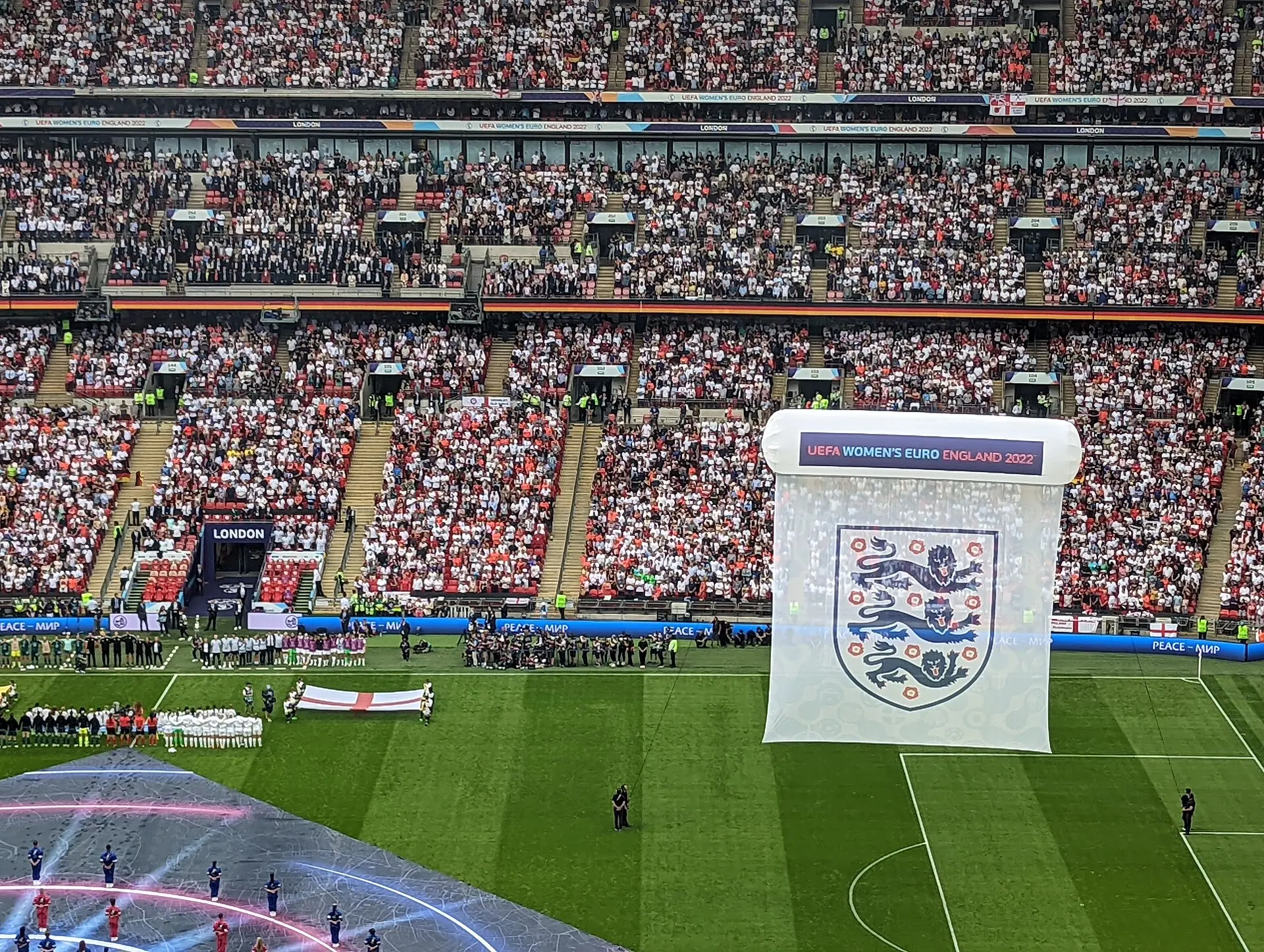 England v Germany, Wembley, Euro 2022 final, 31 July 2022: pre-match scene with the Lionesses lined up beneath the Euro 2022 crest banner. The occasion itself, not the winning goal