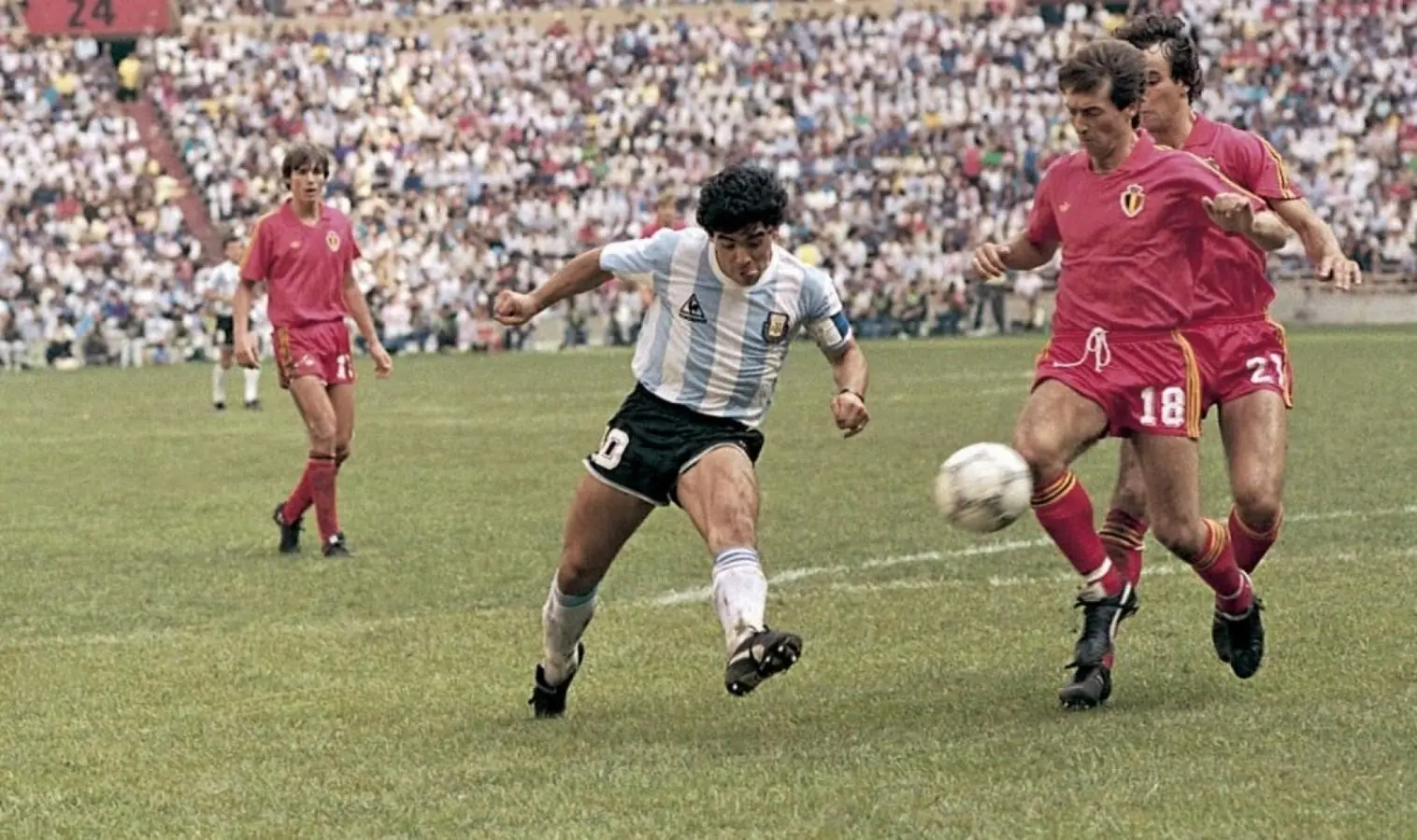 Maradona slips between Veyt and Demol, Argentina v Belgium, 1986